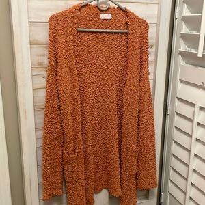 Pink Lily  - size small - rust cardigan